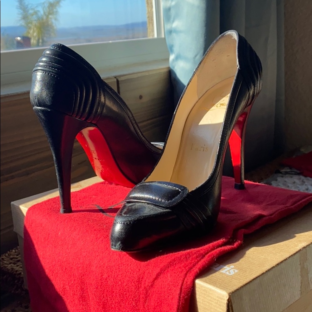 Christian Louboutin almond toe black leather pumps